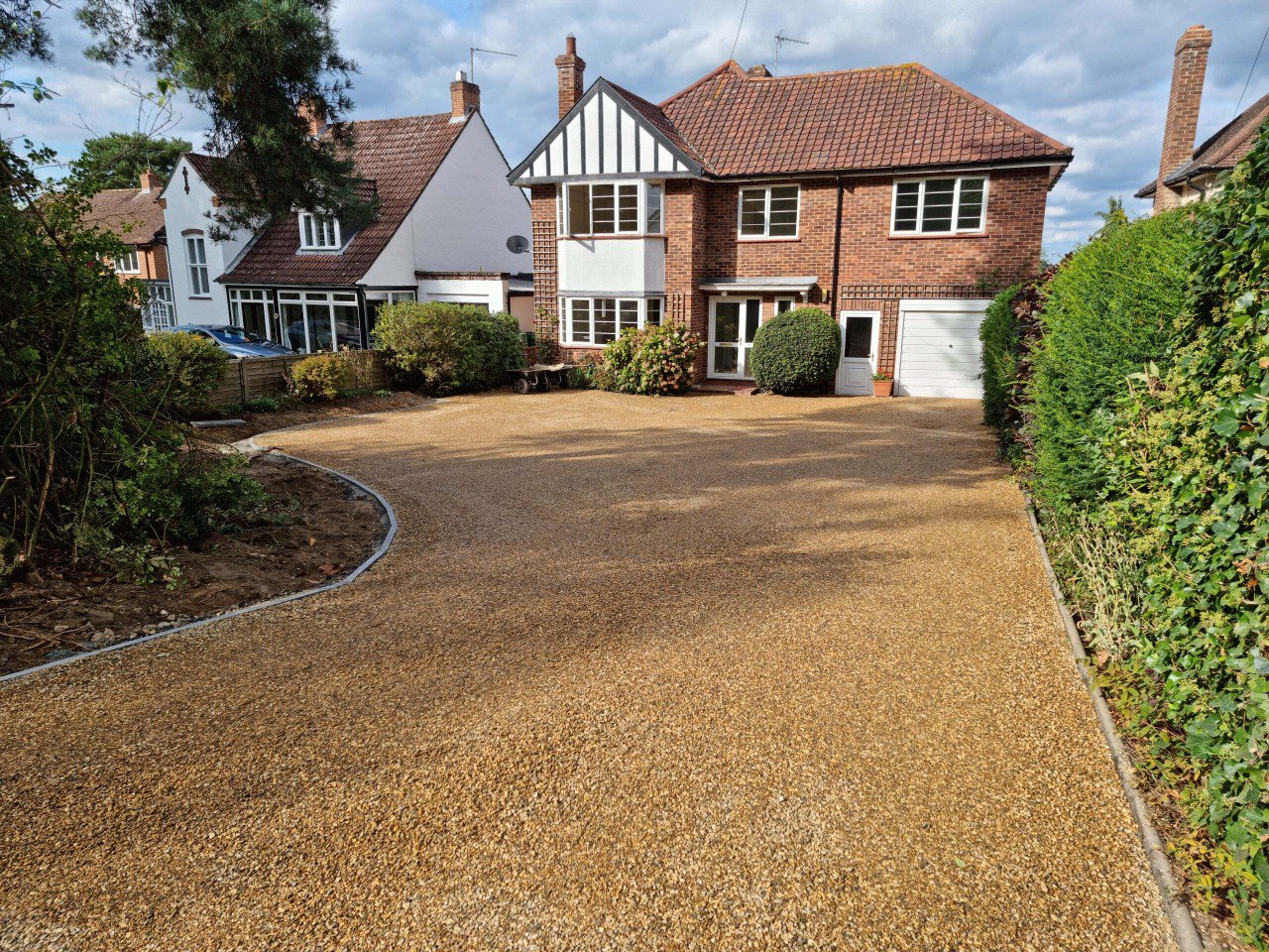 This is a newly installed tar and chip driveway installed by Whitstable Driveways