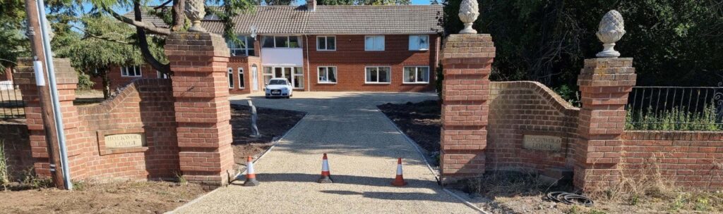 This is a photo of a newly installed chip and tar driveway, installed by Whitstable Driveways